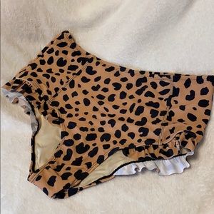 Brand new swim bottoms, large, mocha/black.